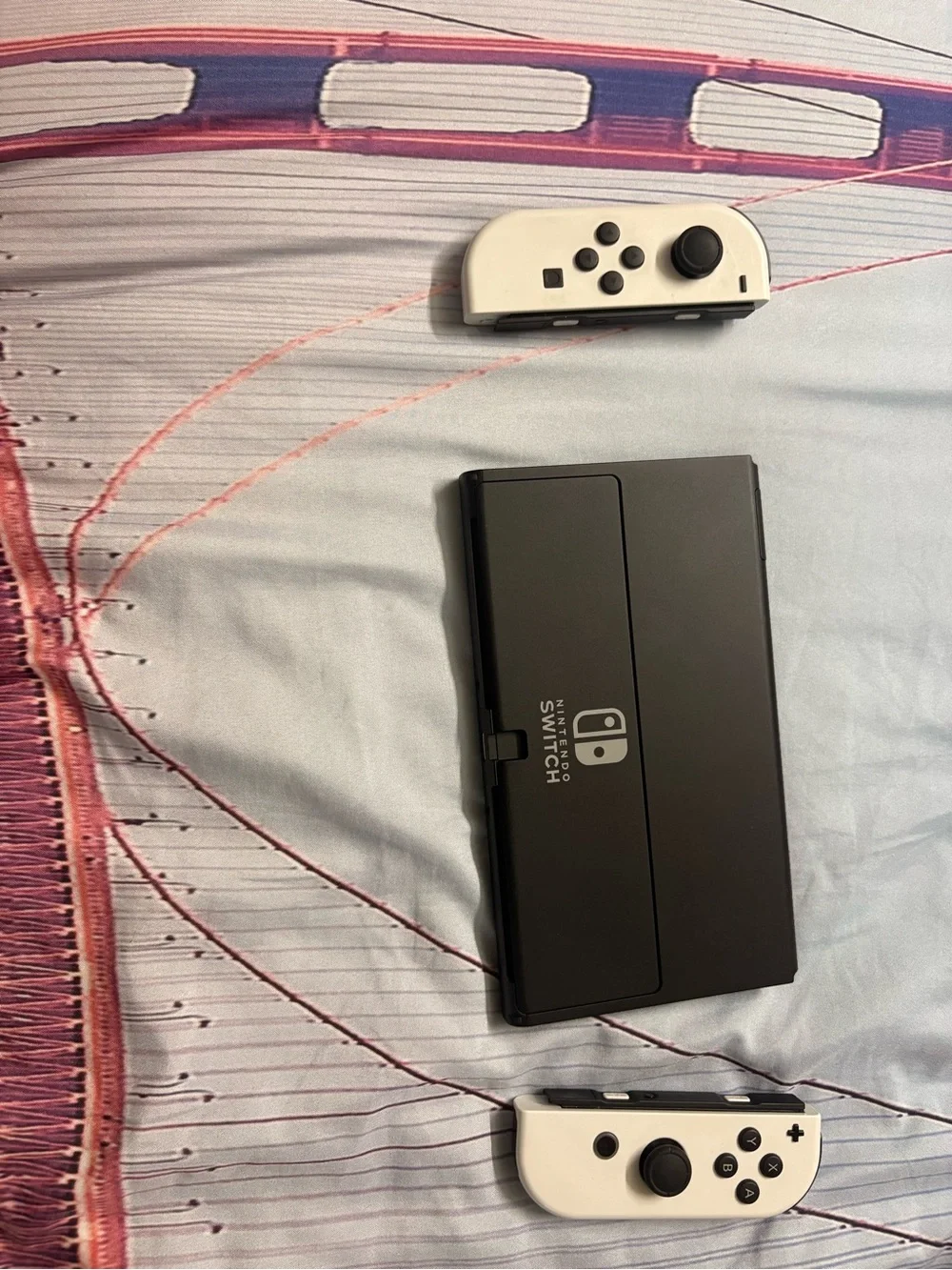 Nintendo Switch OLED Console with White Joy‑Con Controllers
